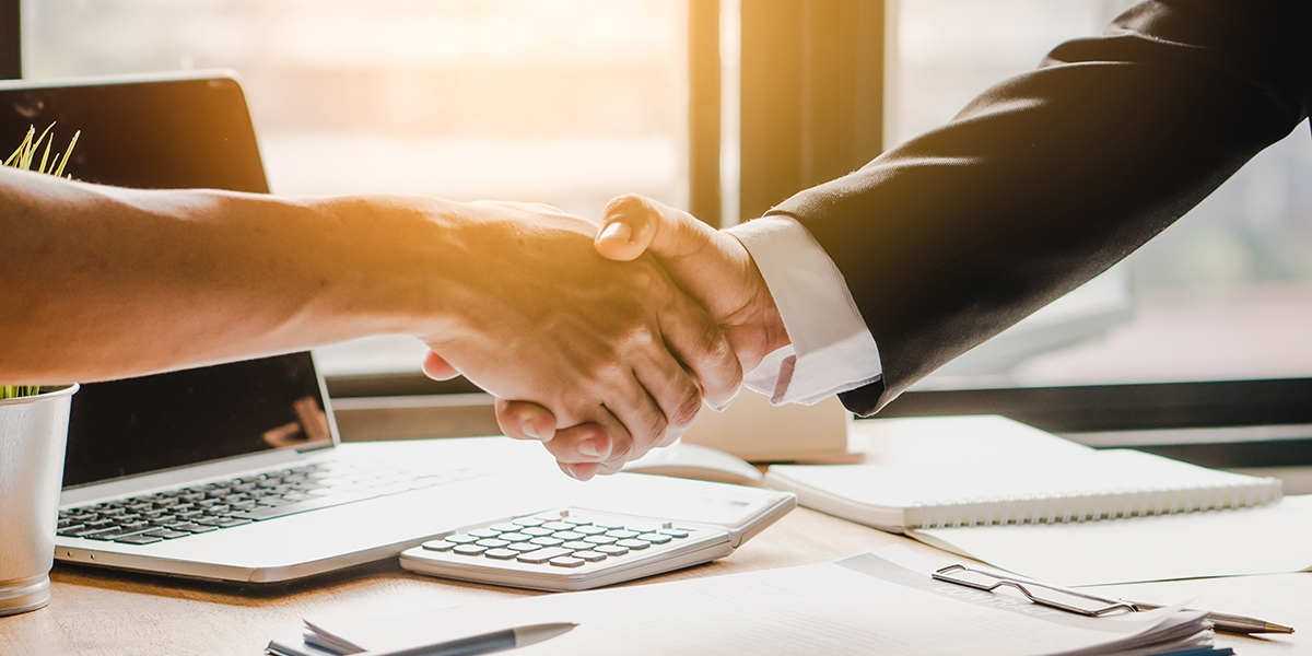 two business people shaking hands